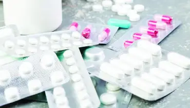 Medicine strips lying on a table.